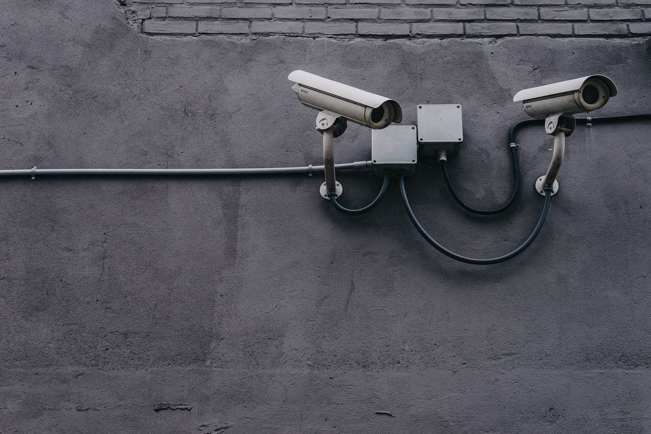 Picture of two security cameras.